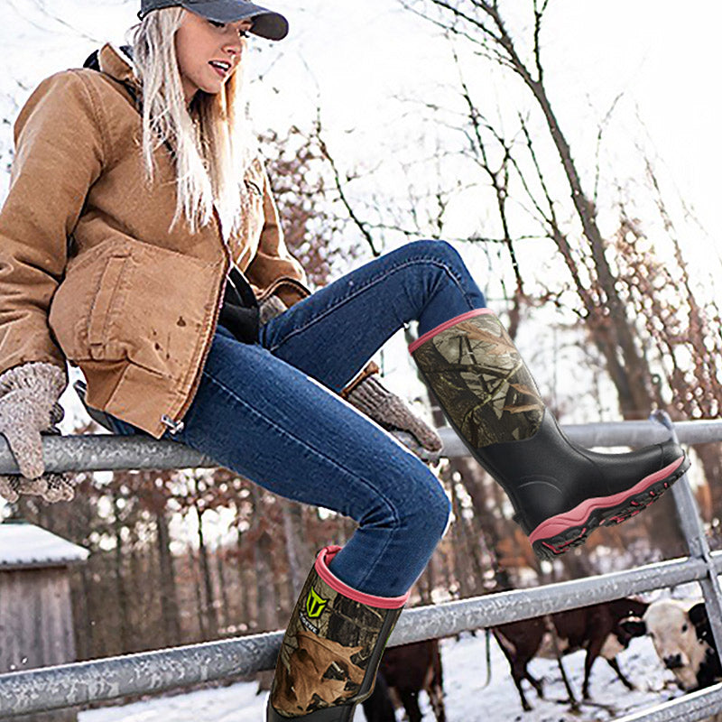 a lady wears TideWe hunting boots at farm